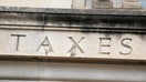 The word &quot;taxes&quot; is seen engraved at the headquarters of the Internal Revenue Service (IRS) in Washington, D.C.,, May 10, 2021. 
