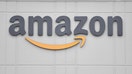 The logo of the U.S. online retail giant Amazon is seen at the distribution center in Staten Island as workers strike in demand that the facility be shut down and cleaned after one staffer tested positive for the coronavirus on March 30, 2020, in New York. 