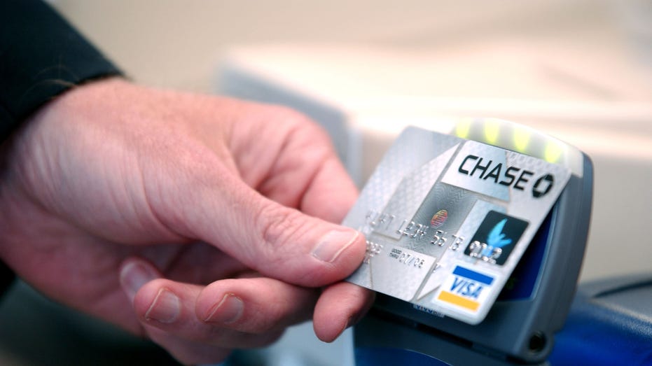 Chase Bank credit card with "blink" technology is displayed during a press conference at an Arbys restaurant on June 8, 2005 in Denver, Colo.