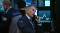 US stocks trending down early Tuesday morning as investors return to work after holiday weekend