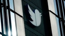 A Twitter logo hangs outside the companys offices in San Francisco, on Dec. 19, 2022. Twitter experienced a bevy of glitches Monday, March 6, 2023 as links stopped working, some users were unable to log in and images were not loading for others. 